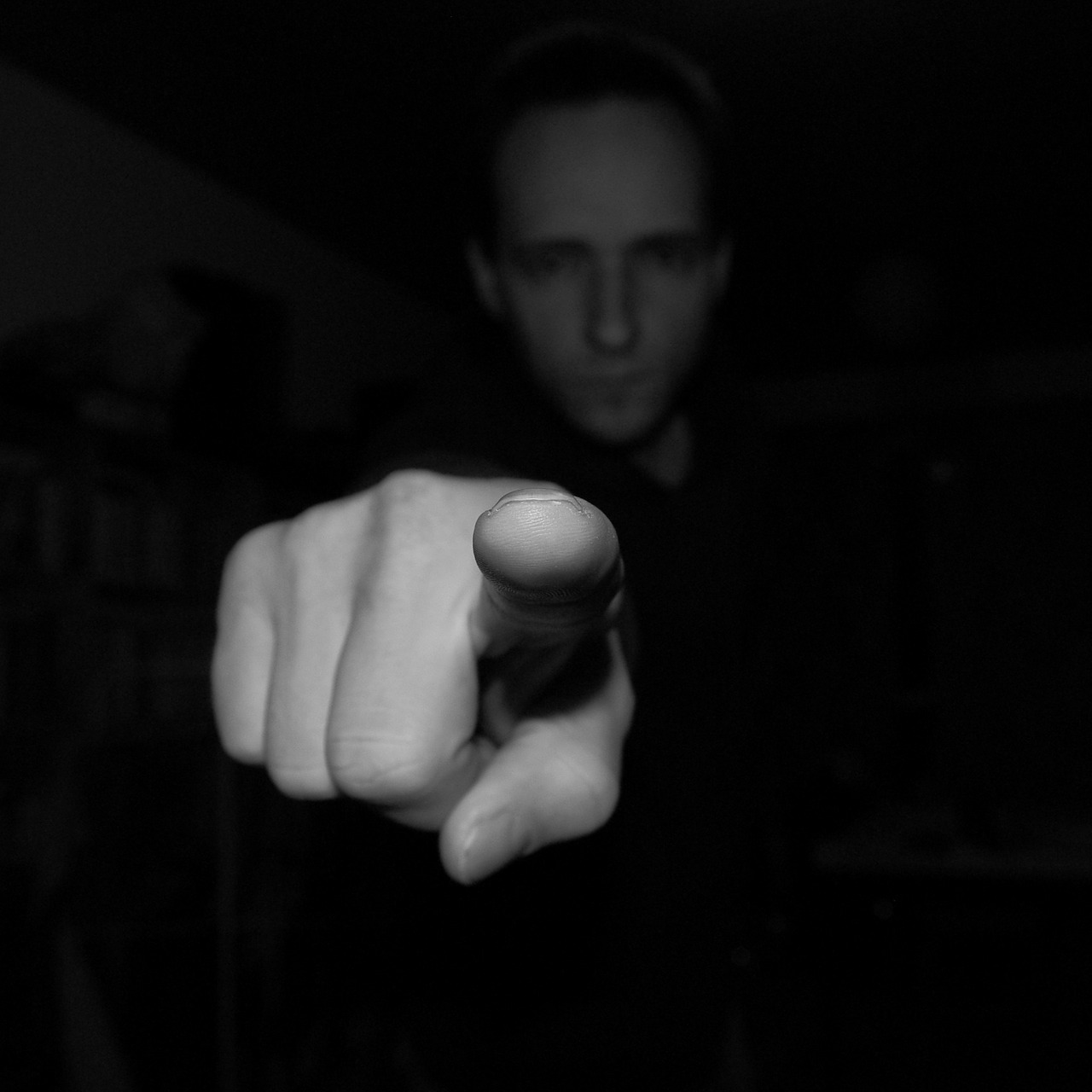 Black and white photo of someone pointing