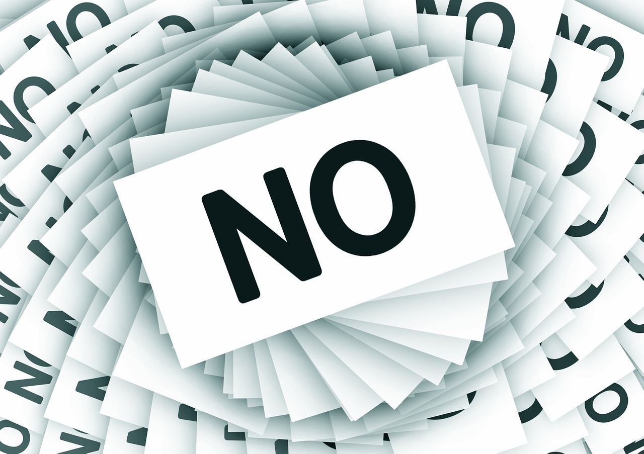 Paper with the word 'no'