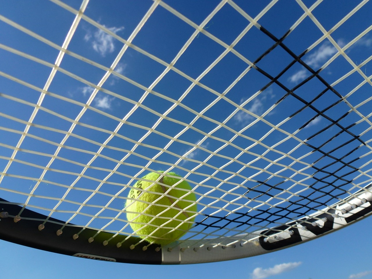 Tennis racket with tennis ball