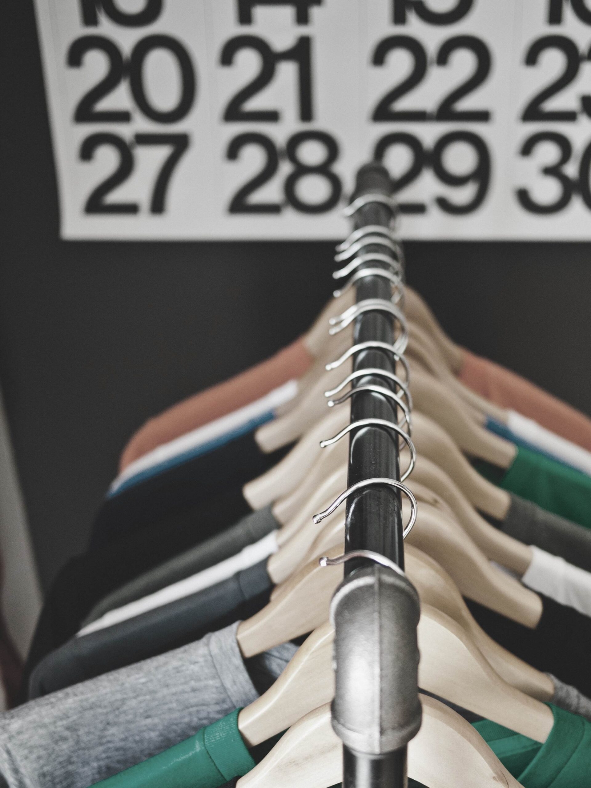 Clothing rack full of shirts