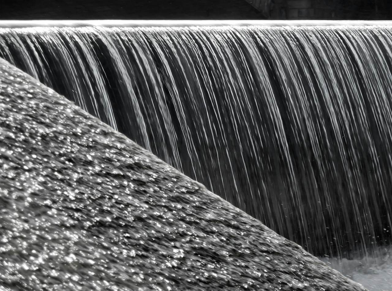 Water feature with water flowing