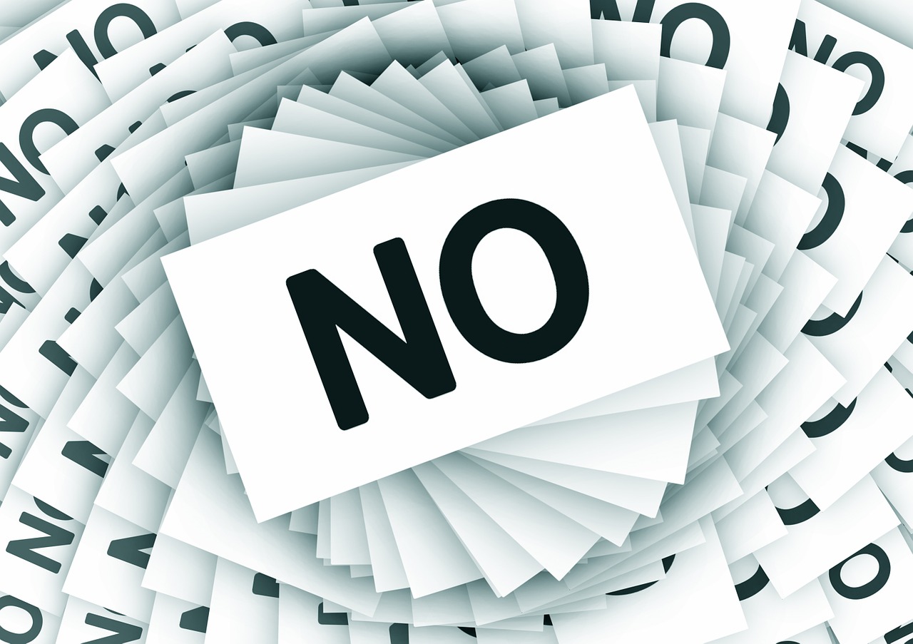 Pieces of paper that say 'no'