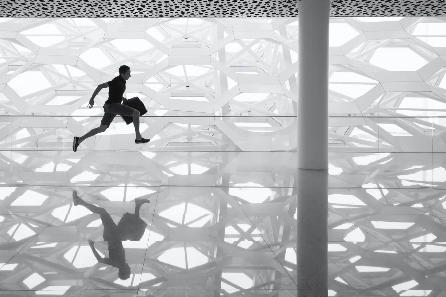 Man running through building