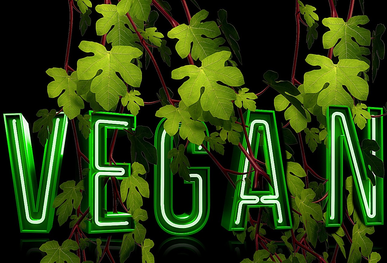 Vegan neon sign with foliage