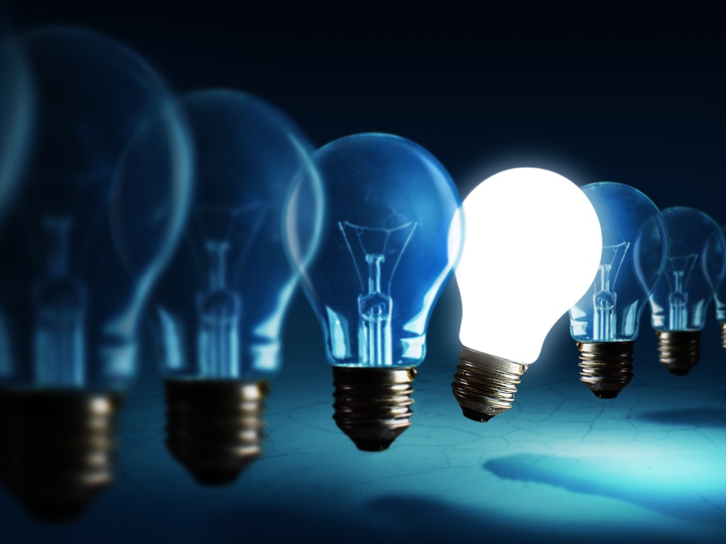 lightbulbs-on-blue-background-idea-concept-picture-id1018003646