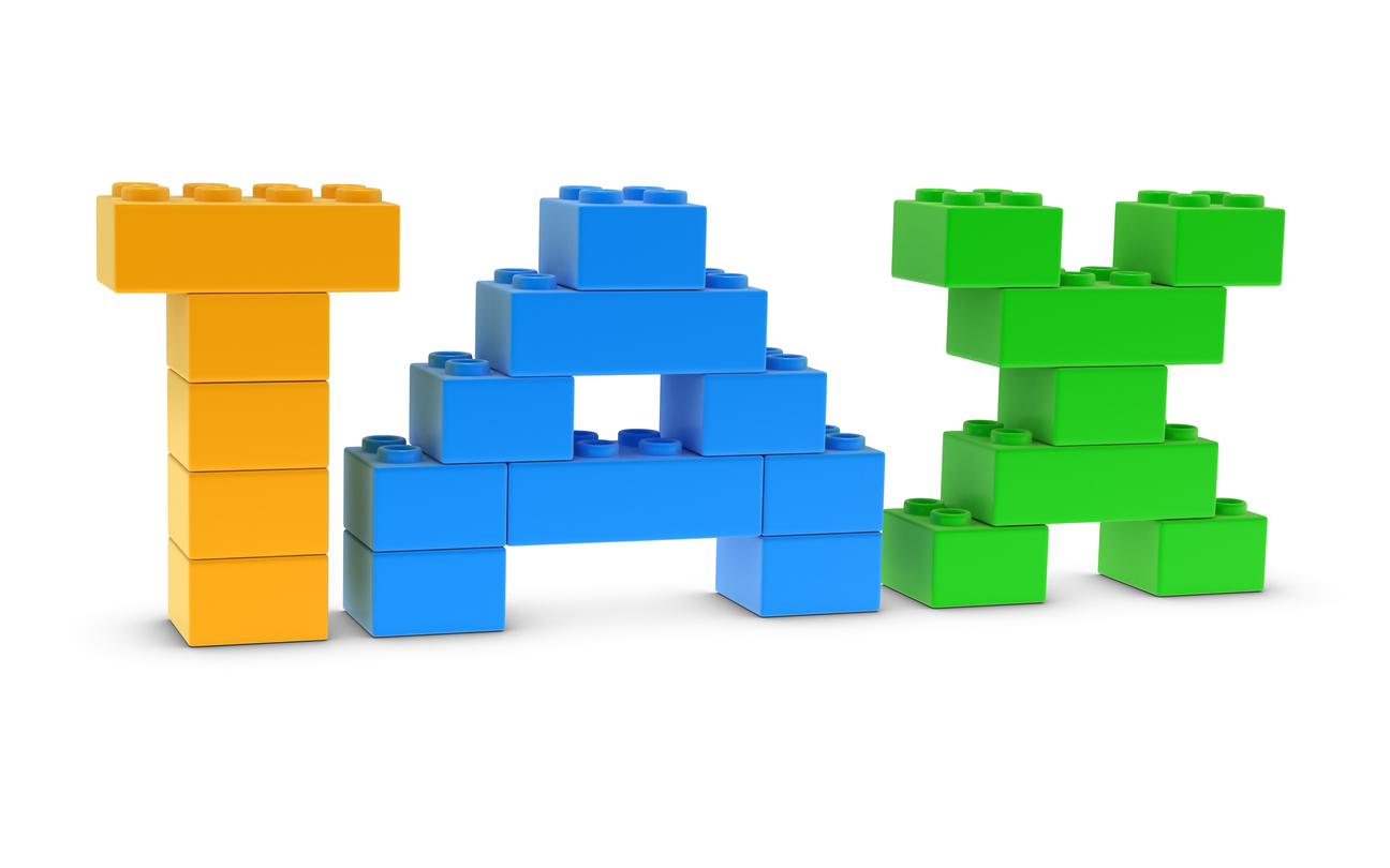 Building blocks spelling out 'tax'